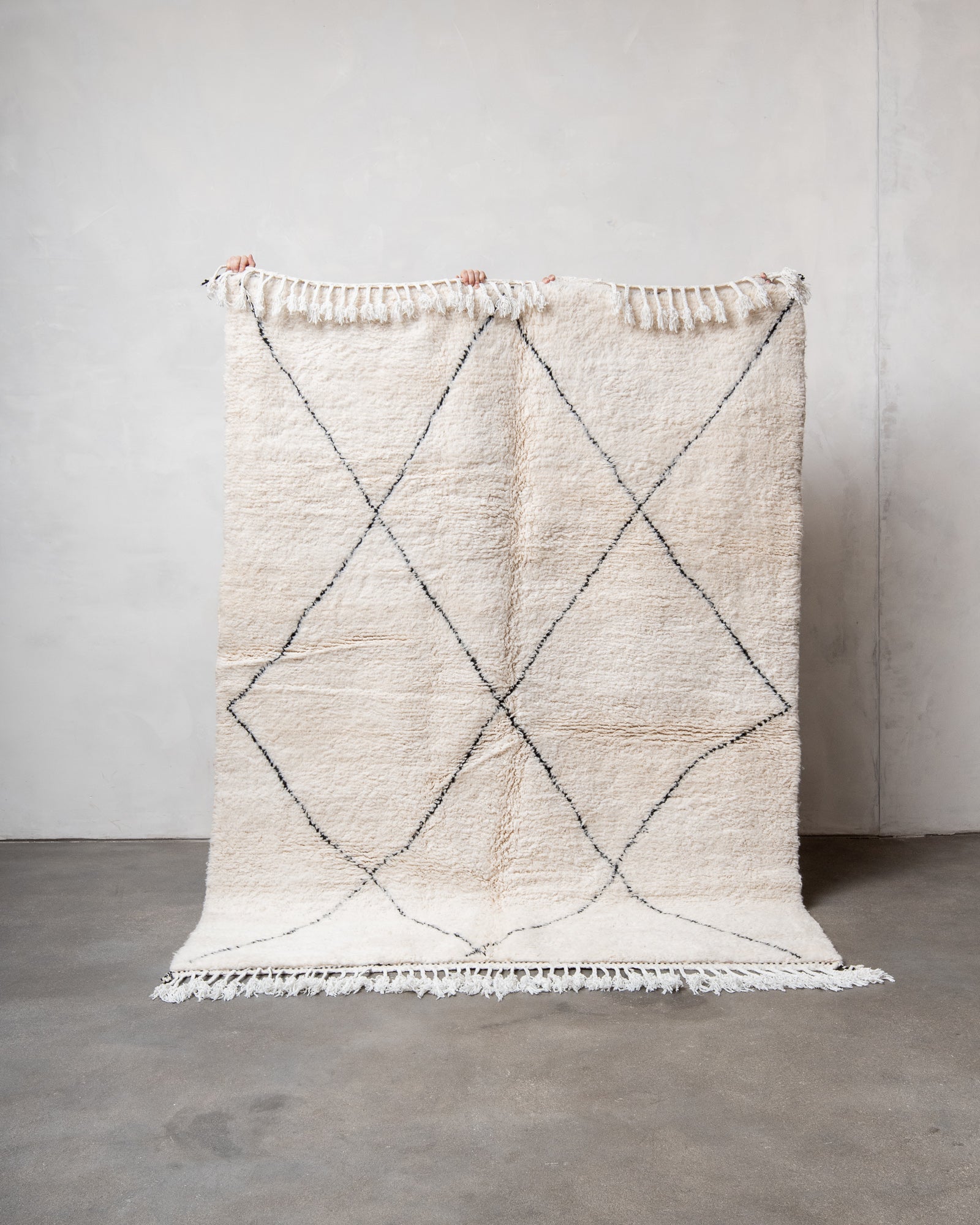 Modern, designer, handcrafted Berber rug from Morocco. Beniourain carpet with beautiful colours and patterns and fluffy wool texture.